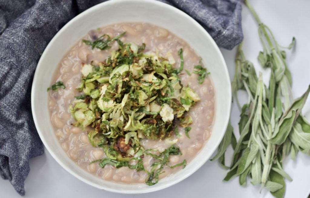 add this vegetarian option to your holiday table – sage white beans with crispy brussels sprouts